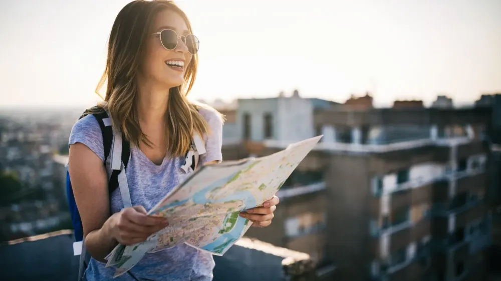 woman traveler looking at map